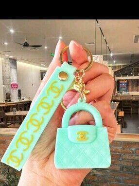 Aqua Quilted Mini Bag Keychain with Gold Accents